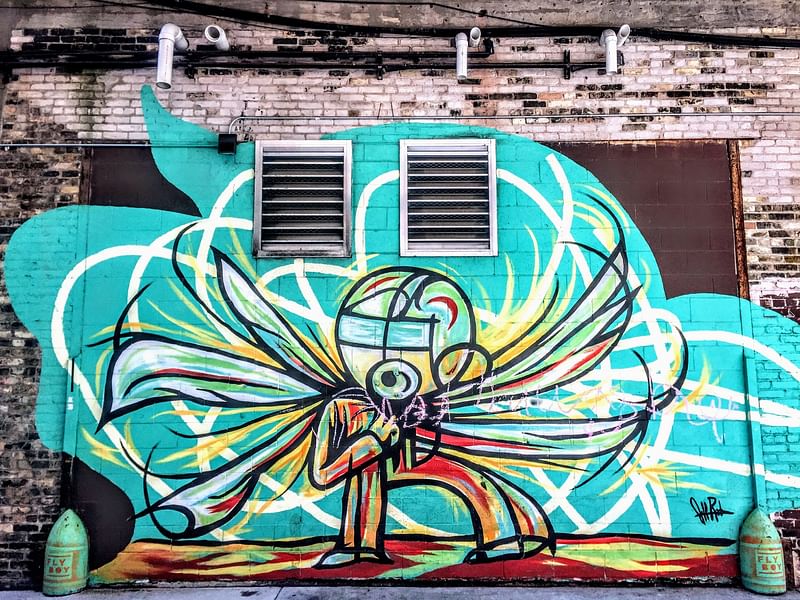 mural in Milwaukee by artist Jeff Redmon.