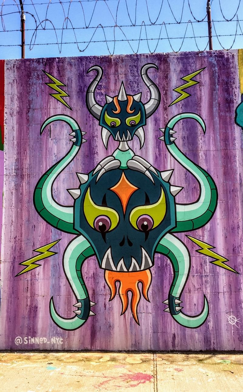 mural in  by artist Sinned.