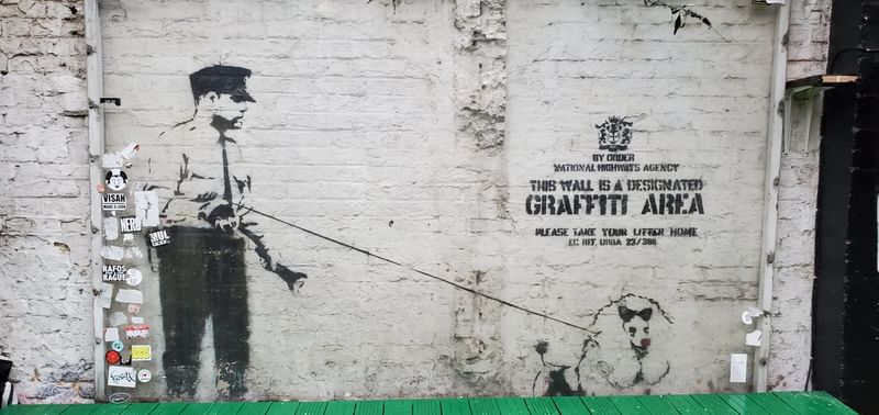 mural in London by artist Banksy.