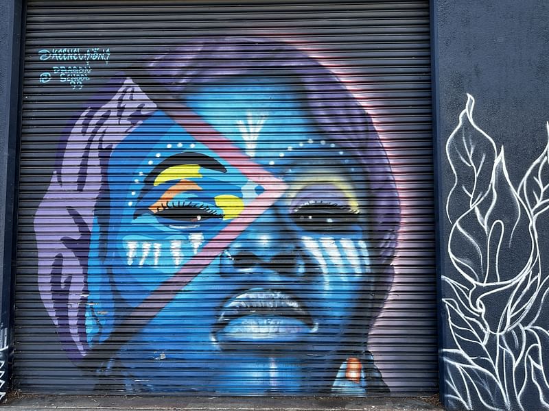 mural in Oakland by artist unknown.