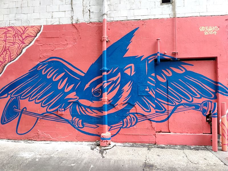 mural in Seattle by artist Tavo Garavato.
