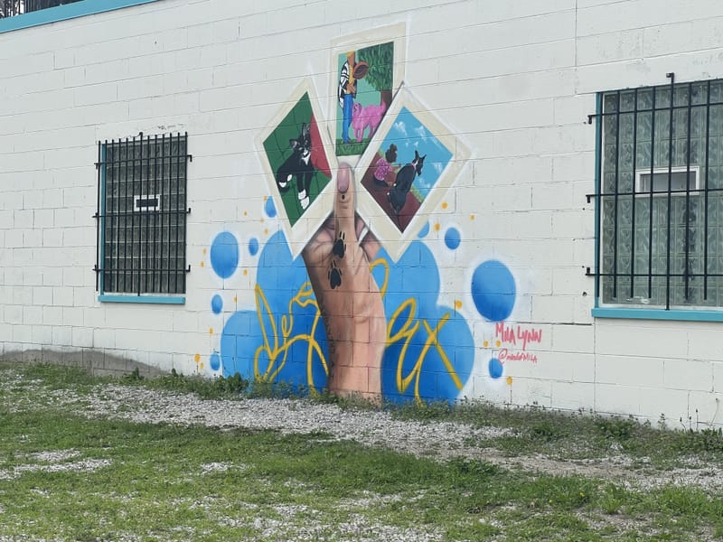 mural in Hamtramck by artist Mila Lynn.