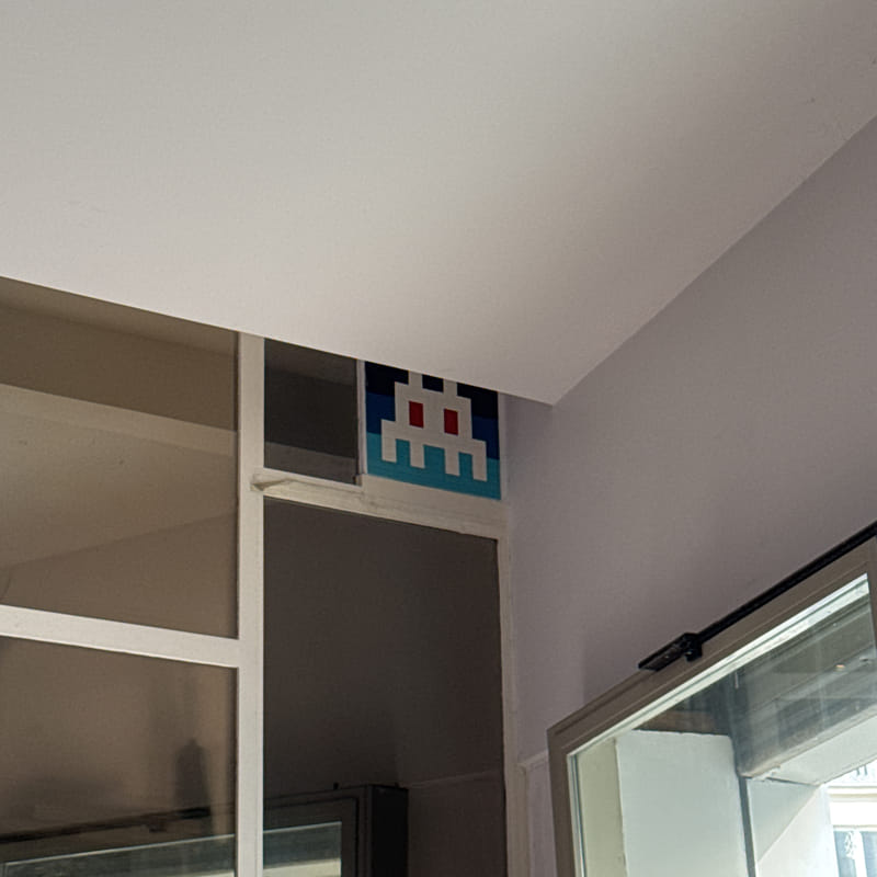 mural in Paris by artist Invader.