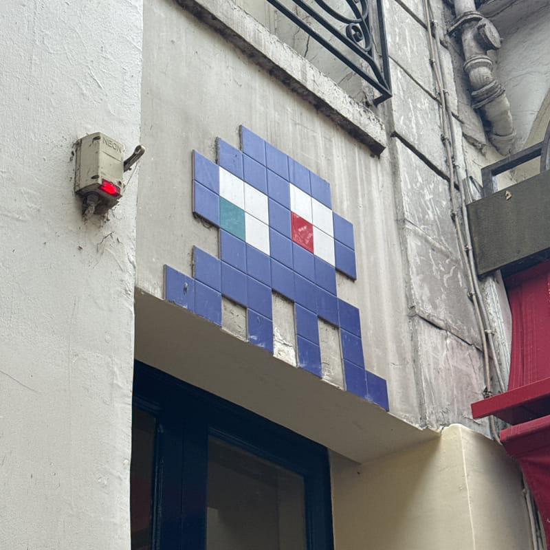 mural in Paris by artist Invader.