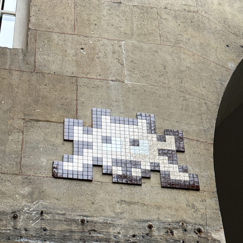 mural in Paris by artist Invader.
