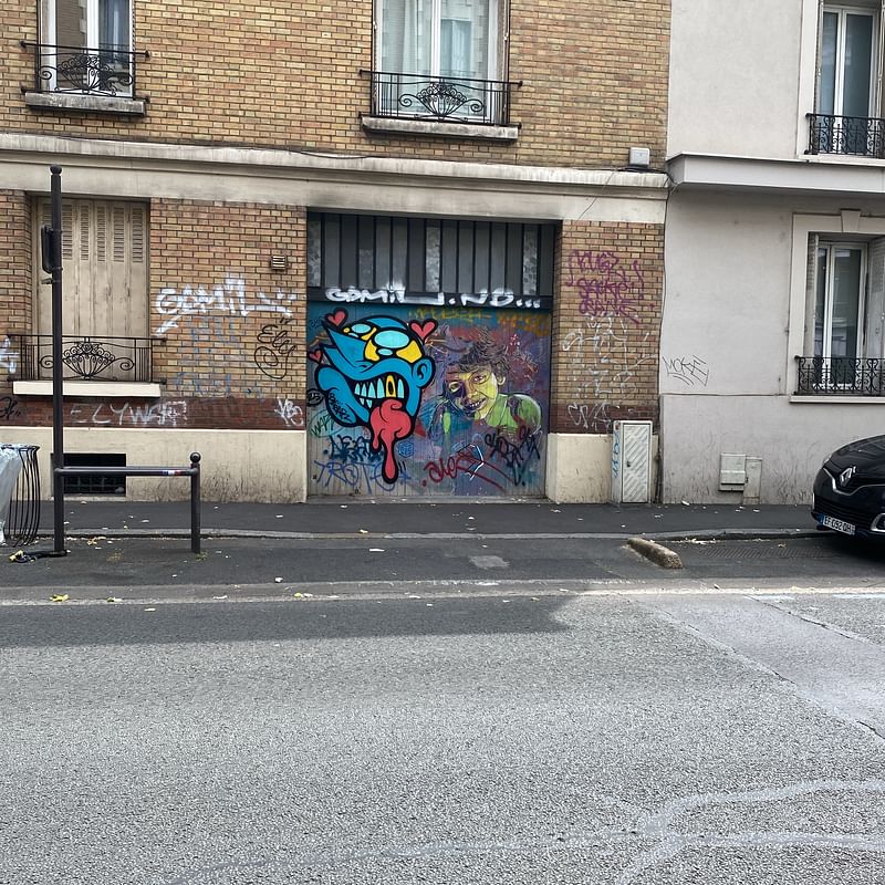 mural in Vitry-sur-Seine by artist C215.