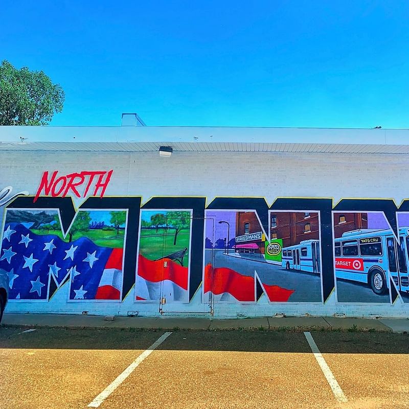 mural in Minneapolis by artist Tats Cru.