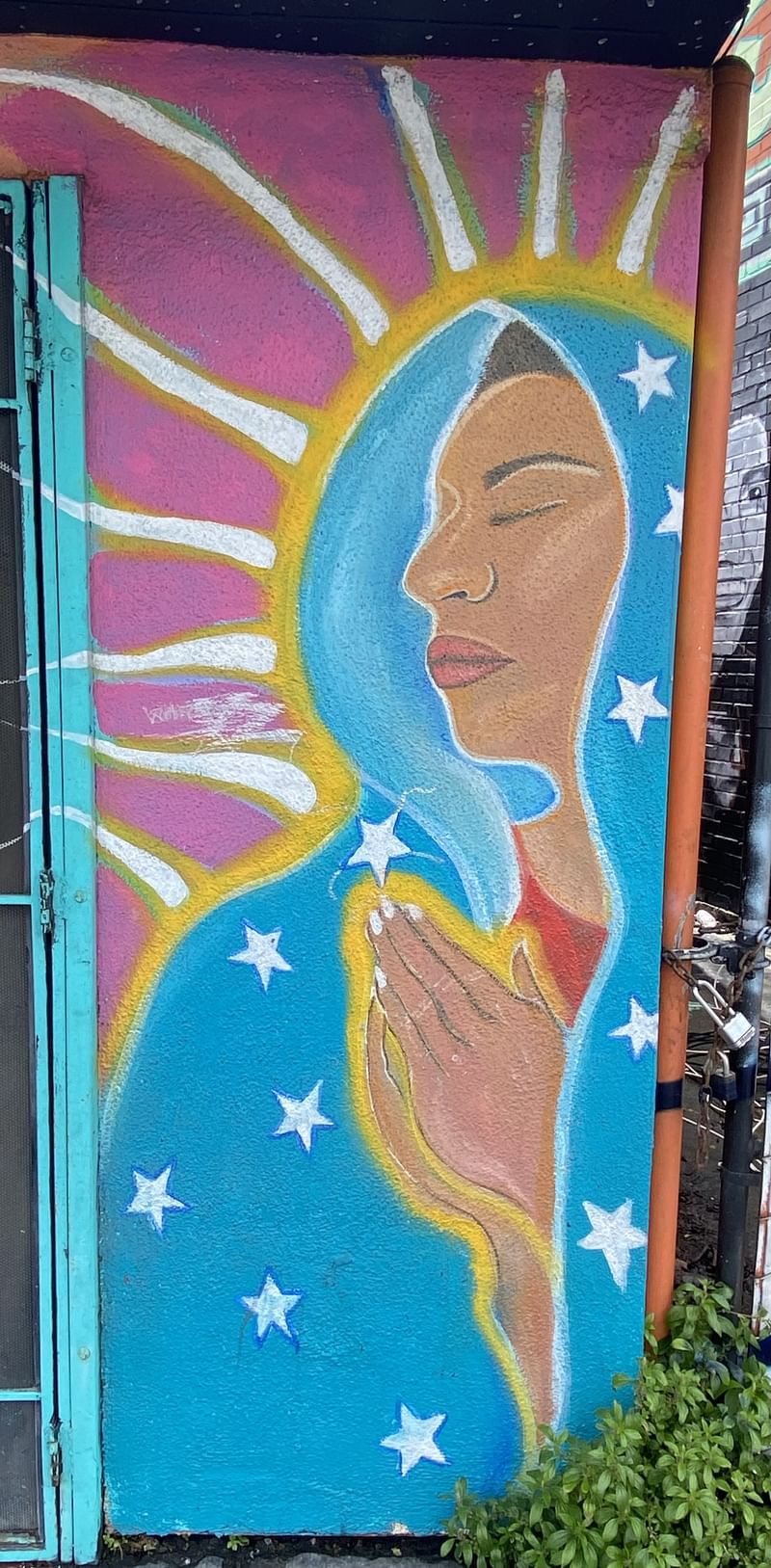 mural in Oakland by artist unknown.